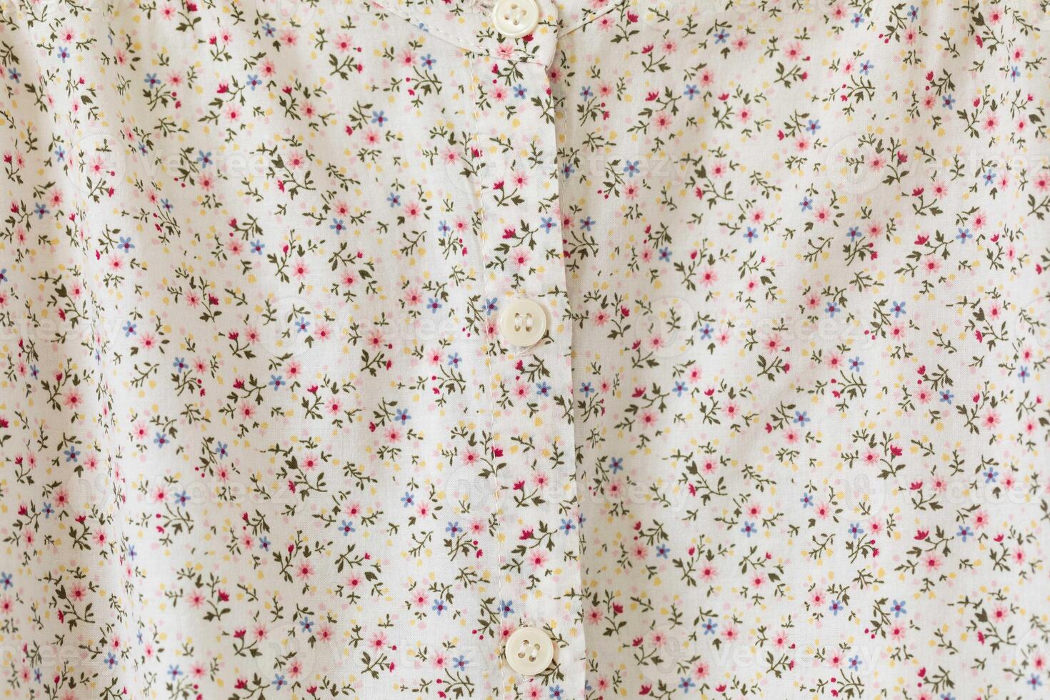 Textile pattern with floral ornament on fabric. photo