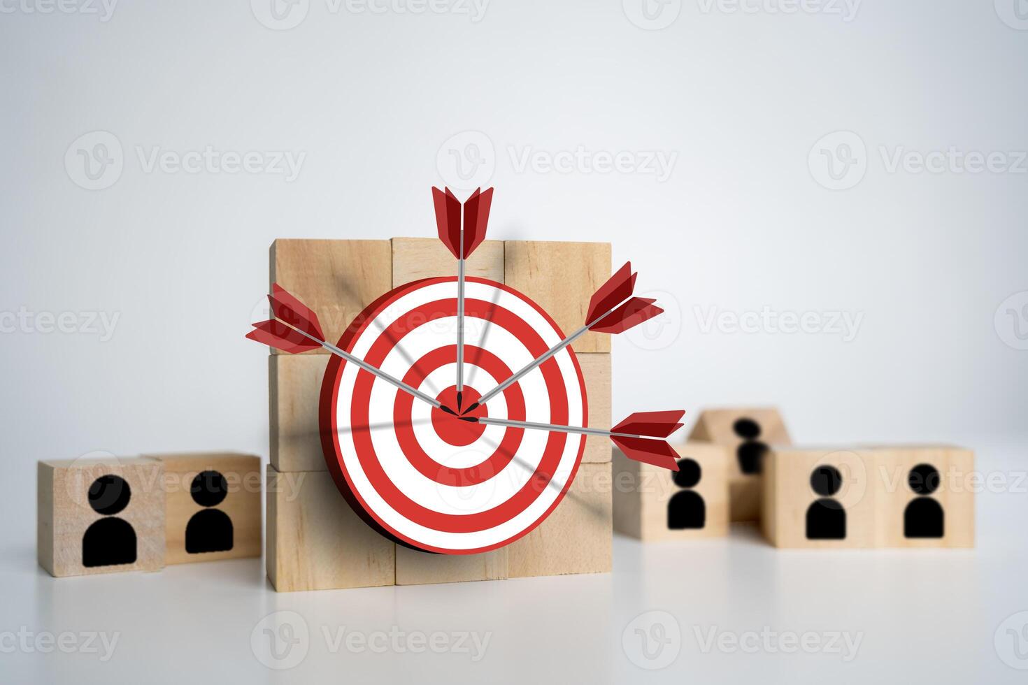 Red dartboard and black arrow connection linkage with human icon for customer focus target group photo
