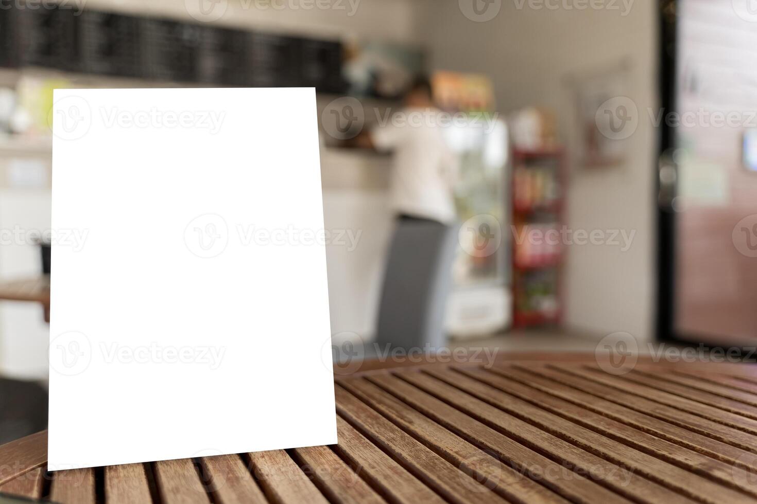 Mock up Label the blank menu frame in Bar restaurant ,Stand for booklets with white sheets paper photo