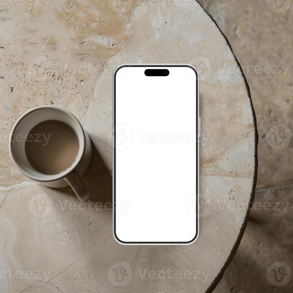 White smartphone mockup template with blank screen on marble surface photo