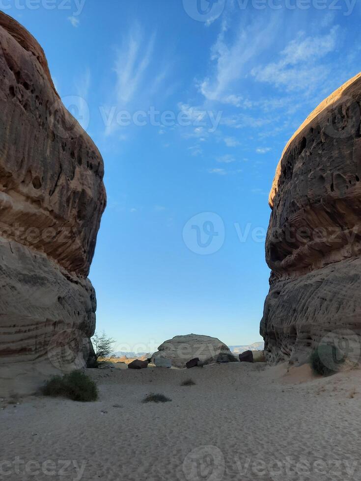 A beautiful view of thousands of years old rocks in the archaeological area of Al Hegra in AlUla, Madain Saleh in Saudi Arabia. photo