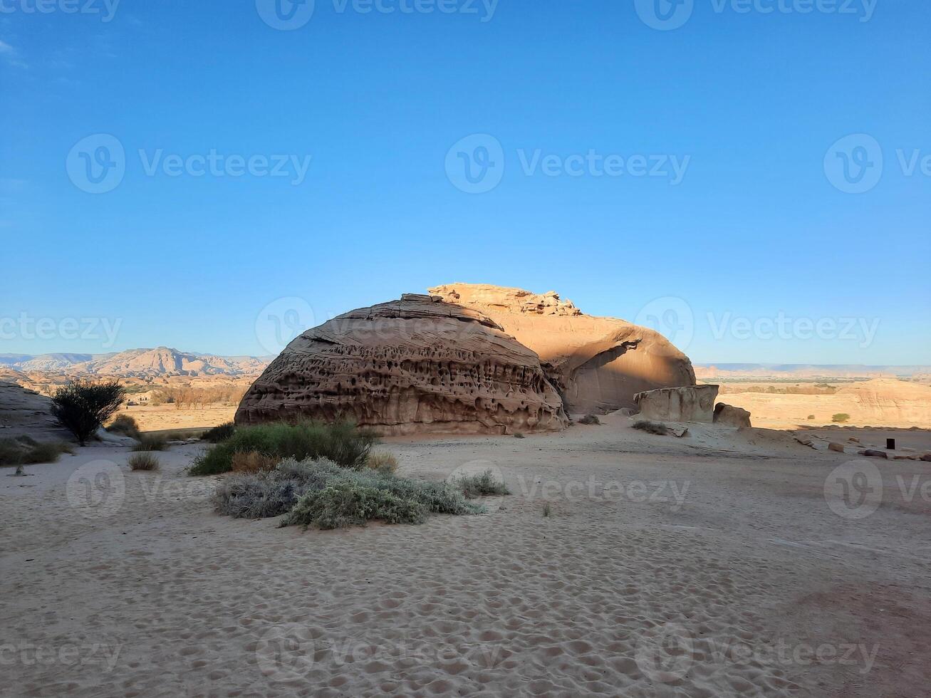 A beautiful view of thousands of years old rocks in the archaeological area of Al Hegra in AlUla, Madain Saleh in Saudi Arabia. photo