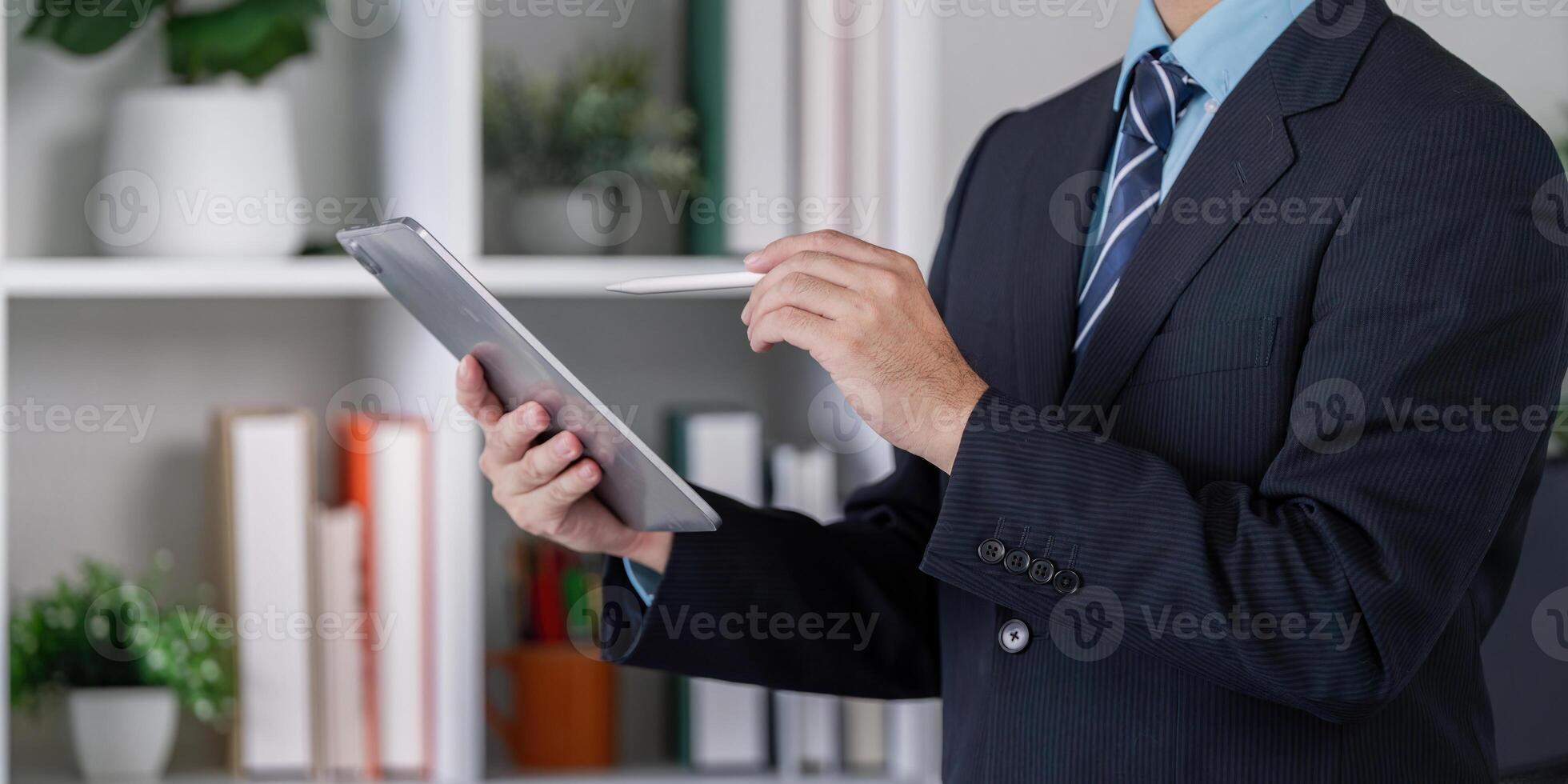Business professional engaging with technology in modern office efficient workflow digital tools professionalism corporate setting photo