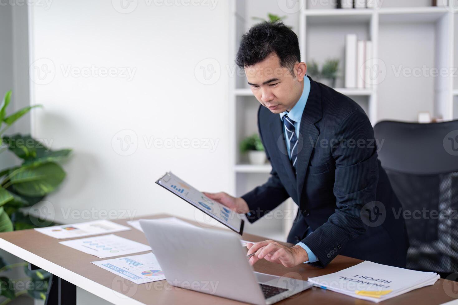 Business professional engaging in data analysis modern office digital workspace focused environment strategic insights photo