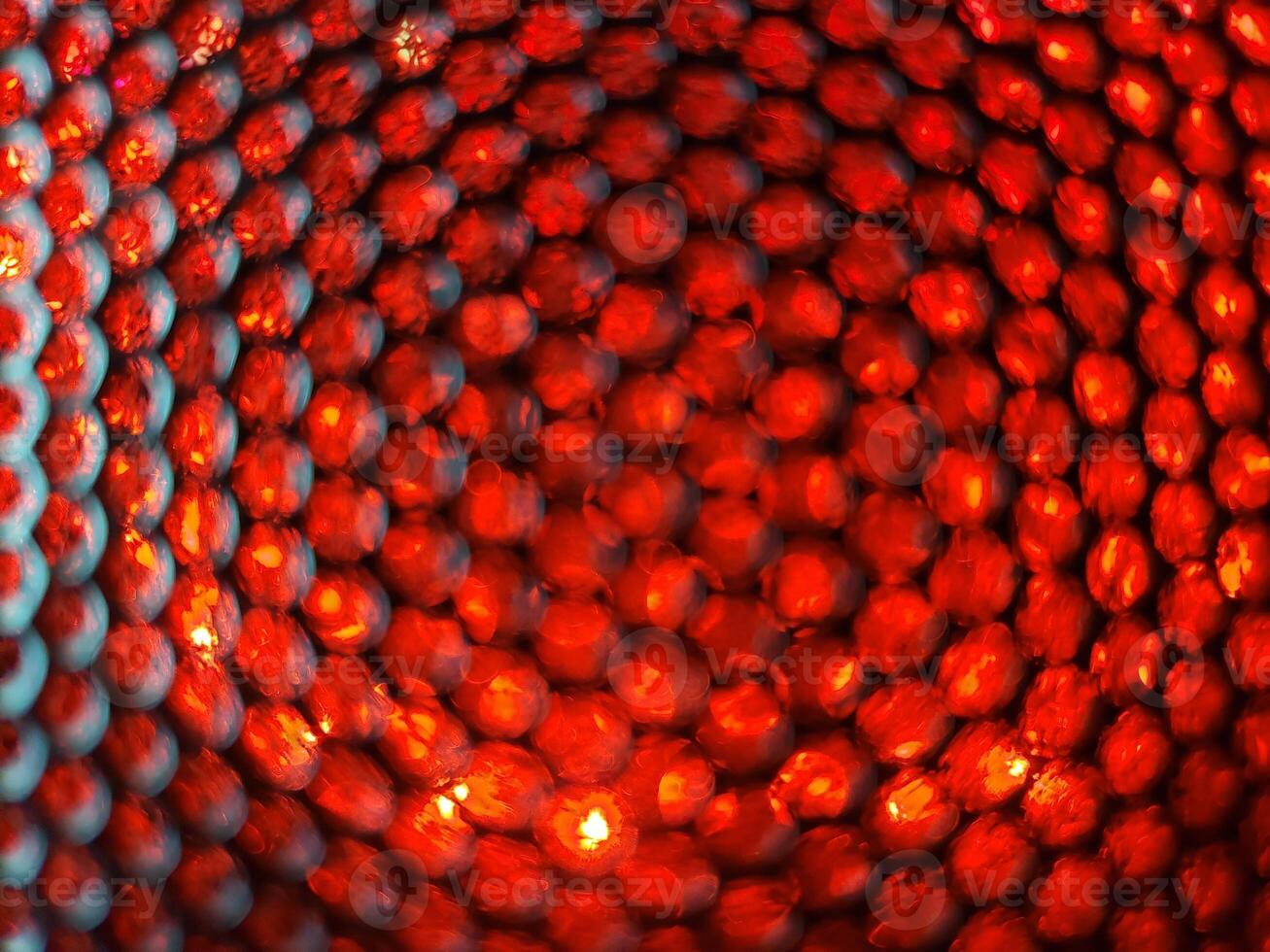 A close up of a red light bulb photo