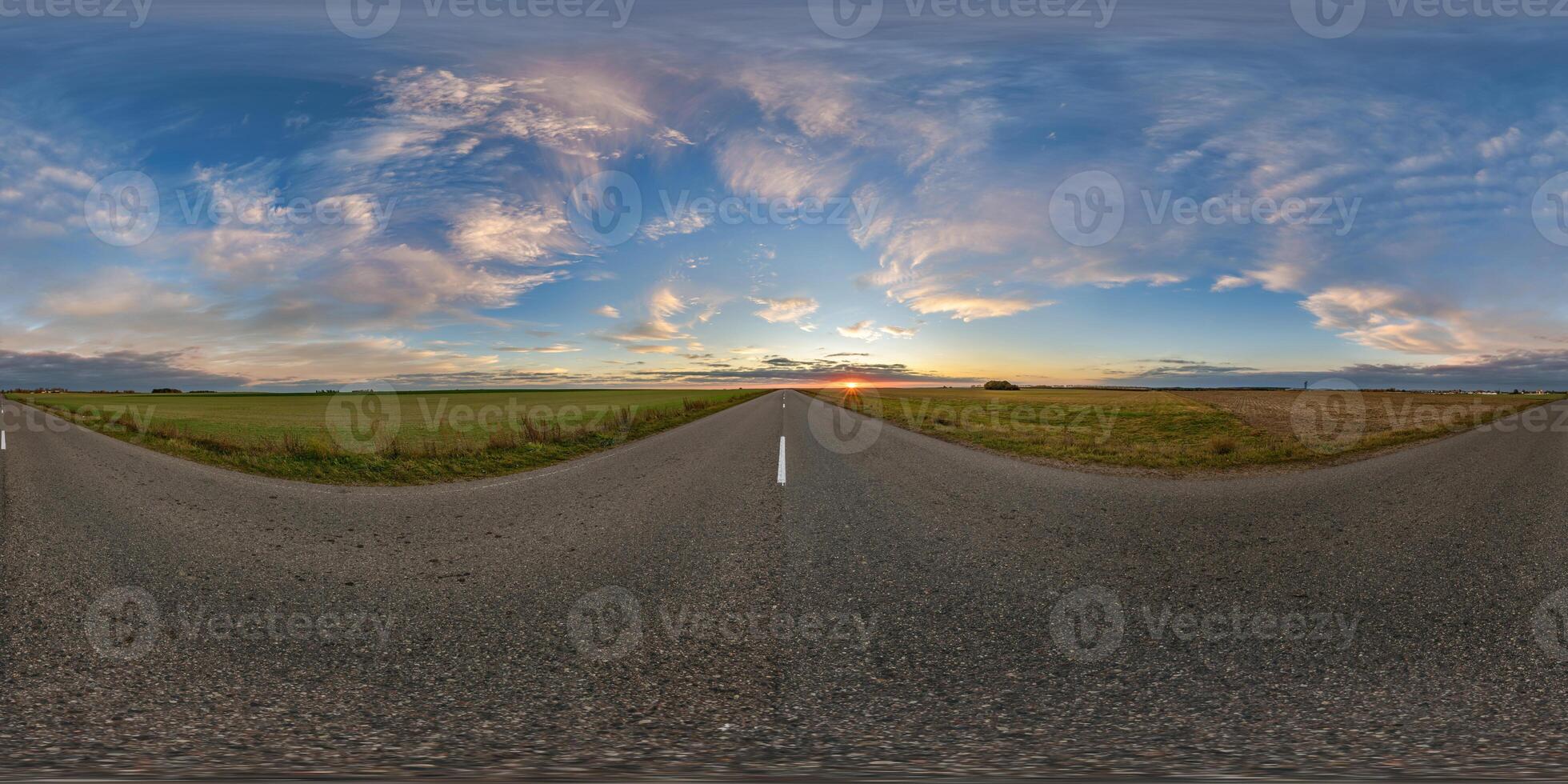 spherical 360 hdri panorama on asphalt road with clouds and evening sky before sunset in equirectangular seamless projection, as skydome replacement in drone panoramas, game development photo