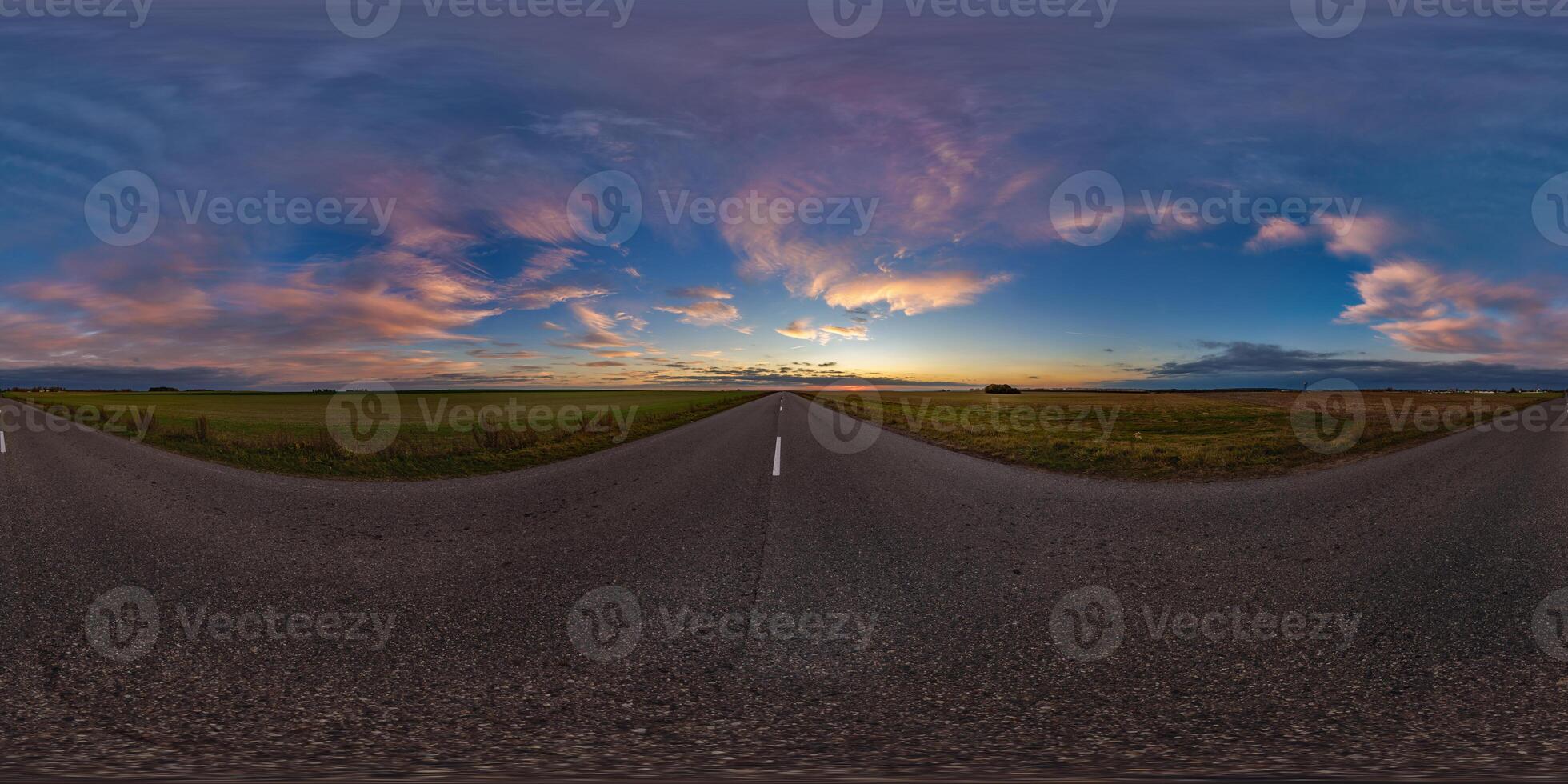 hdri 360 panorama on gravel road among fields in spring nasty evening before sunset in equirectangular full seamless spherical projection, for VR AR virtual reality content photo