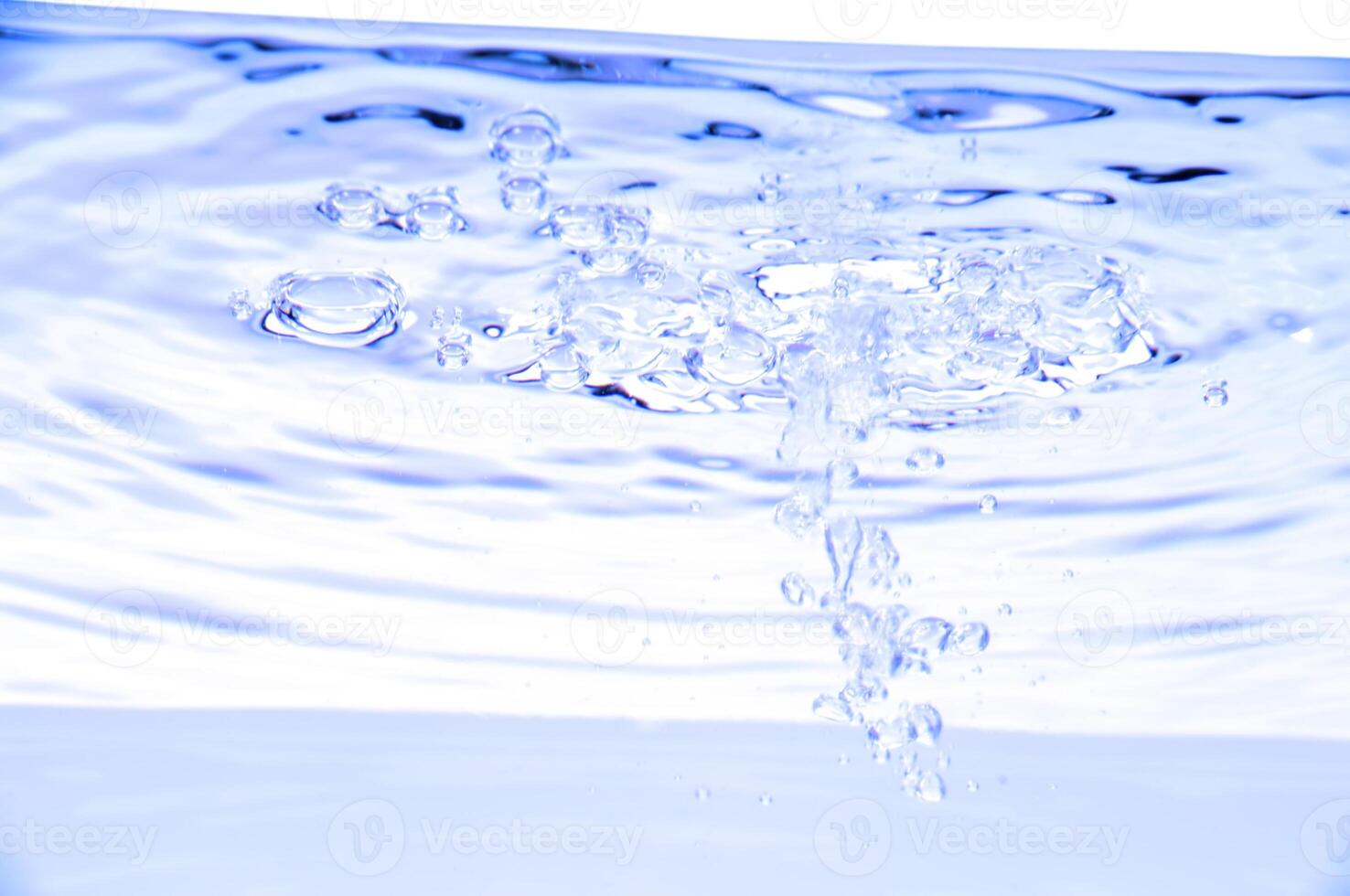 Blue water with air bubles photo
