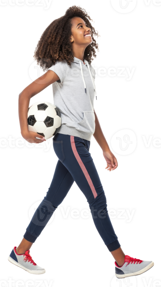 Girl walks confidently while holding a soccer ball on transparent background png