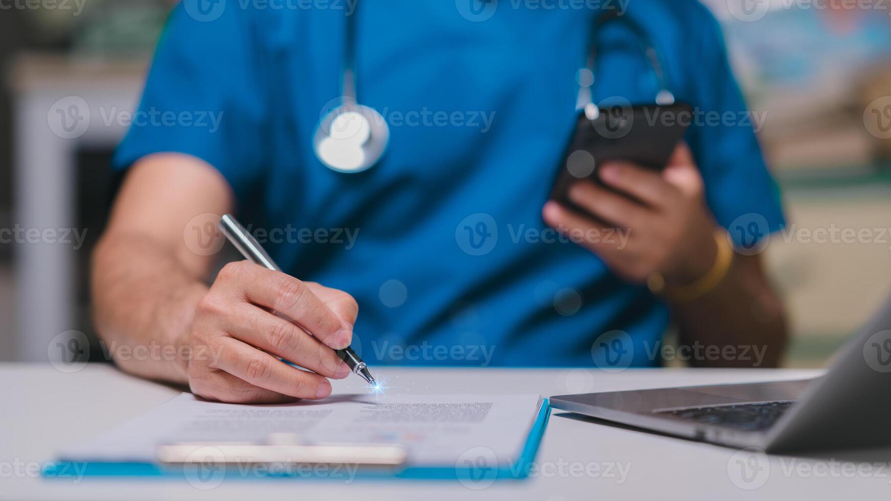Nurse using phones at home concept. Healthcare professional records notes while using smartphone in clinical setting, highlighting integration of technology in modern medical practice and patient care photo