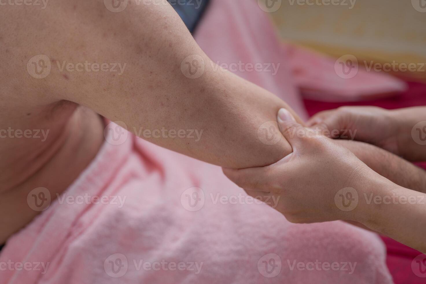 Massage therapy, Soothing arm massage is performed, promoting relaxation and alleviating tension image captures calming moment, emphasizing healing touch of massage therapy photo