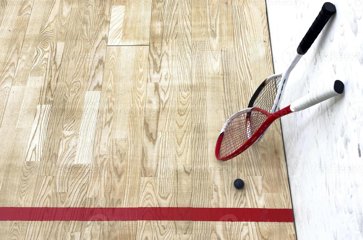 Squash Racket and Ball Sport Played by Two or Four Players. Court Floor and the Rockets photo