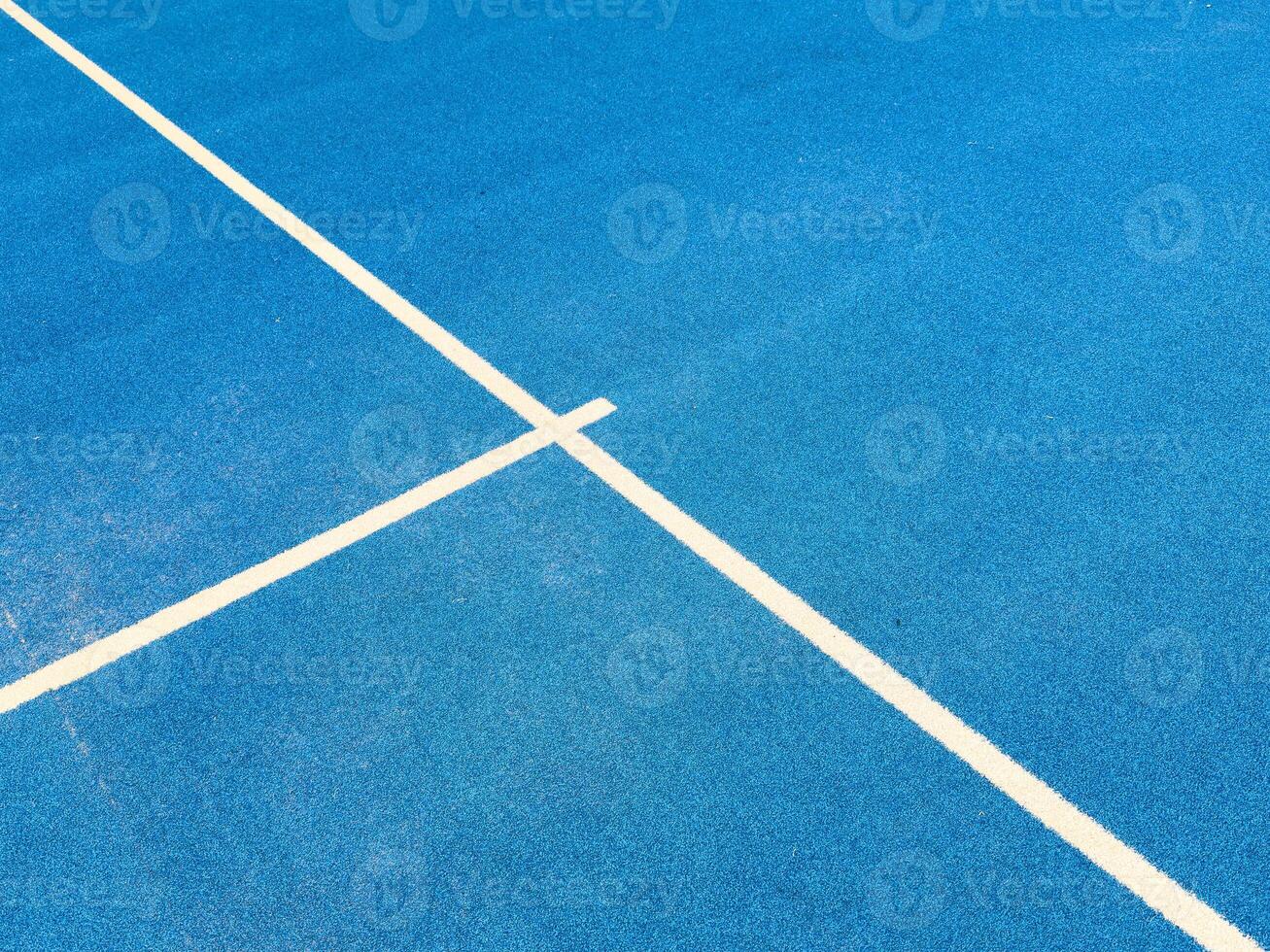 blue paddle tennis court, aerial shot photo