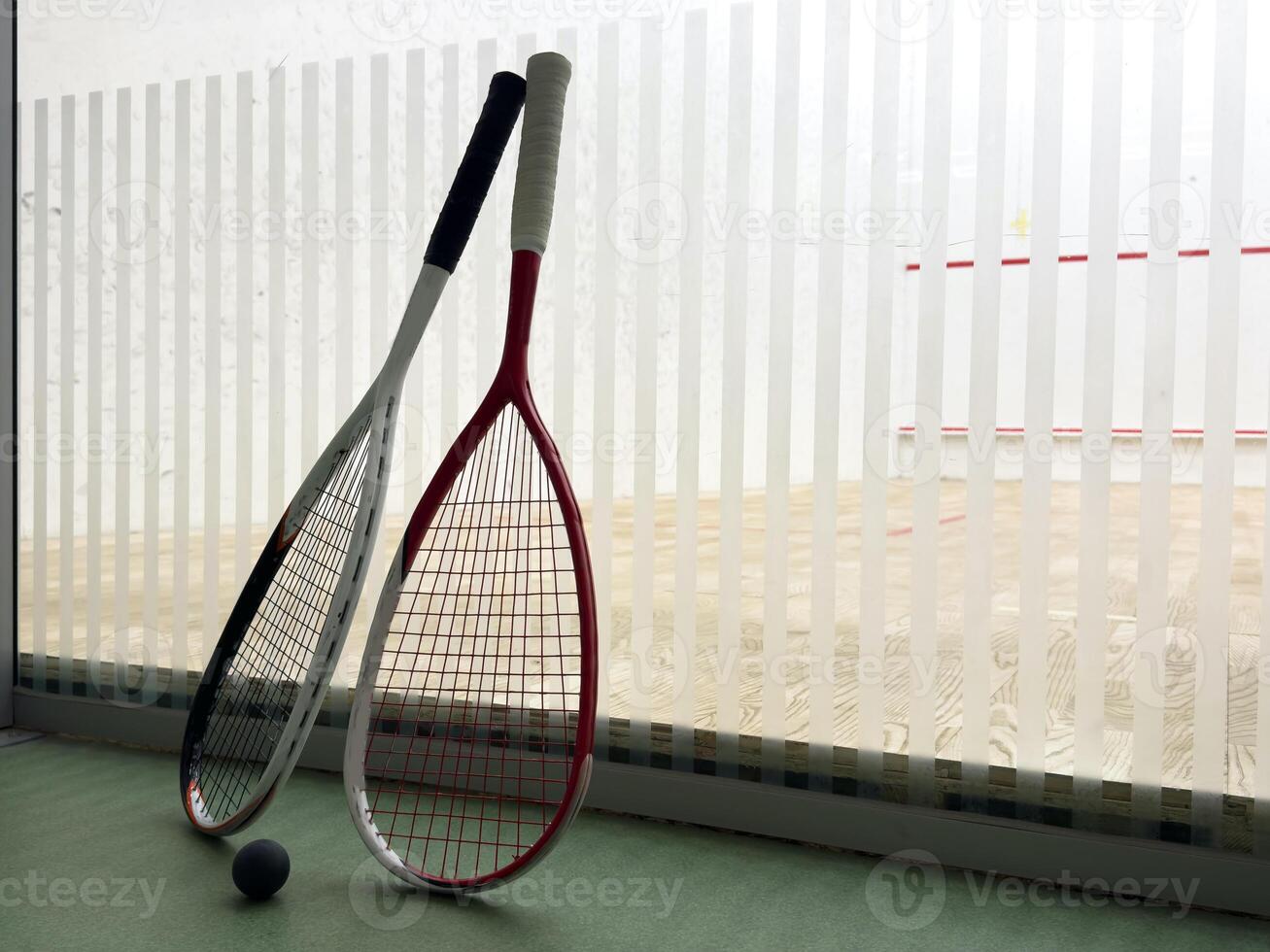 Squash Racket and Ball Sport Played by Two or Four Players. Court Floor and the Rockets photo