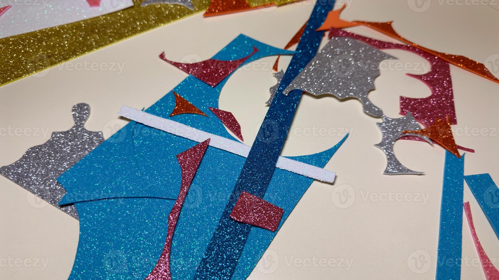 Hobby with foamiran, cutting out elements on table to create art photo