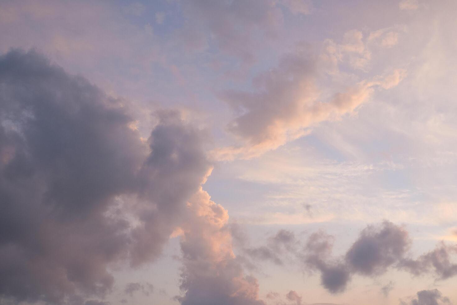 colorful clouds and sky,Dusk, Sunset Sky Clouds in the Evening with colorful Orange, Yellow, Pink and red sunlight and Dramatic storm clouds on Twilight sky photo