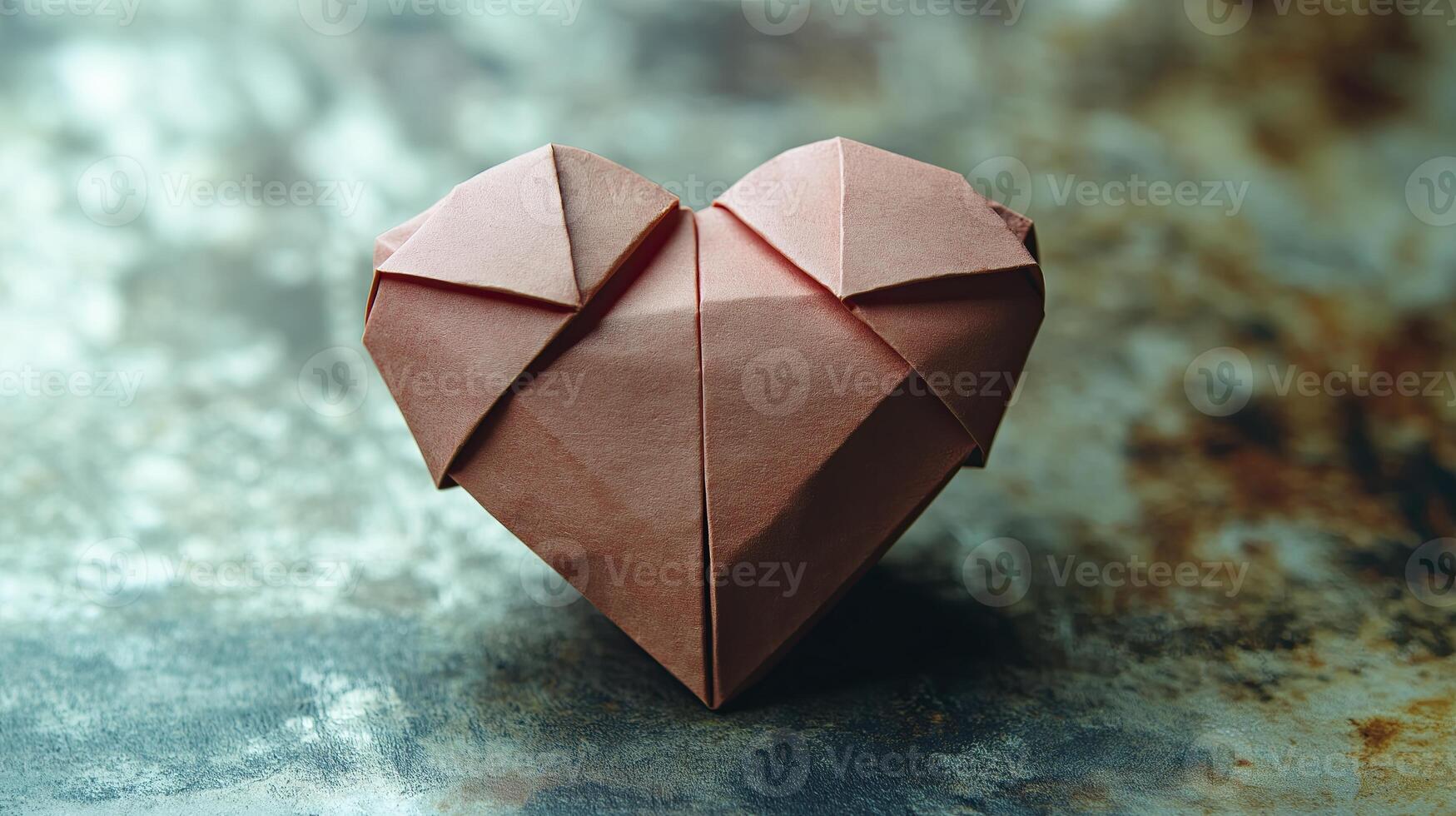 Paper origami heart on bokeh background. Love concept. photo