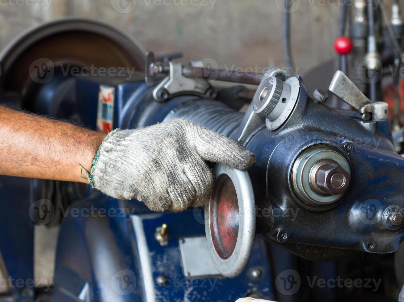 Old lathe in workshop photo