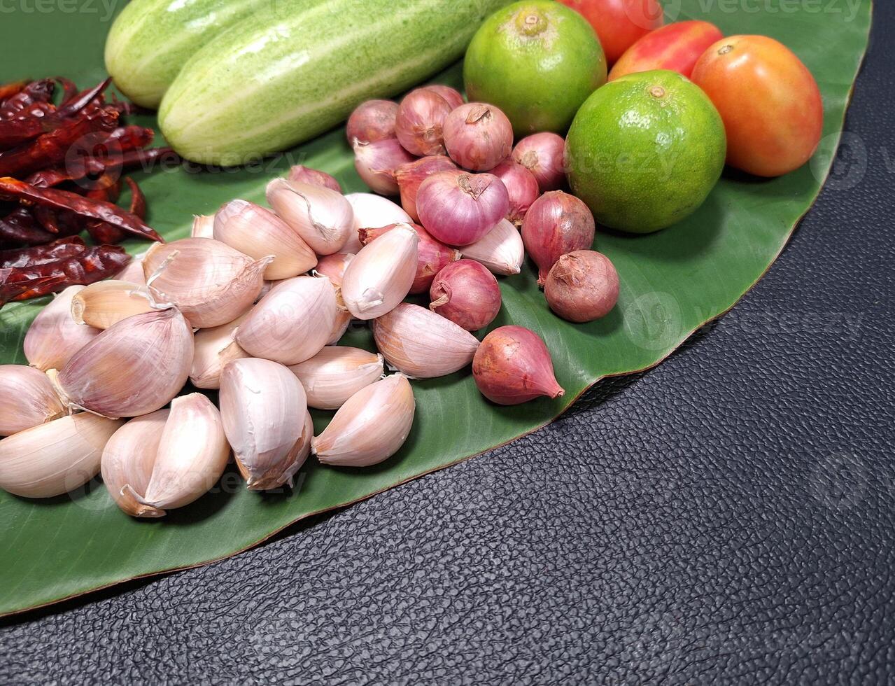 Illustration of background of fresh vegetables and spices used in food preparation. photo