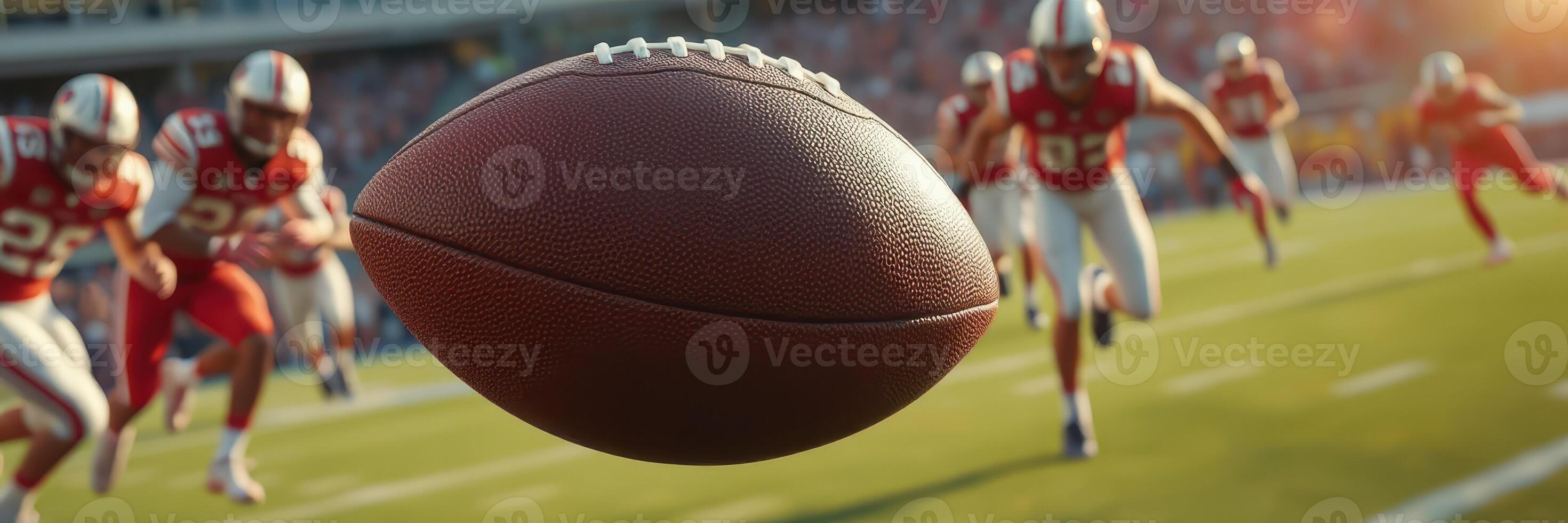 Football players chasing a flying ball during an intense game at a stadium in the fall afternoon photo
