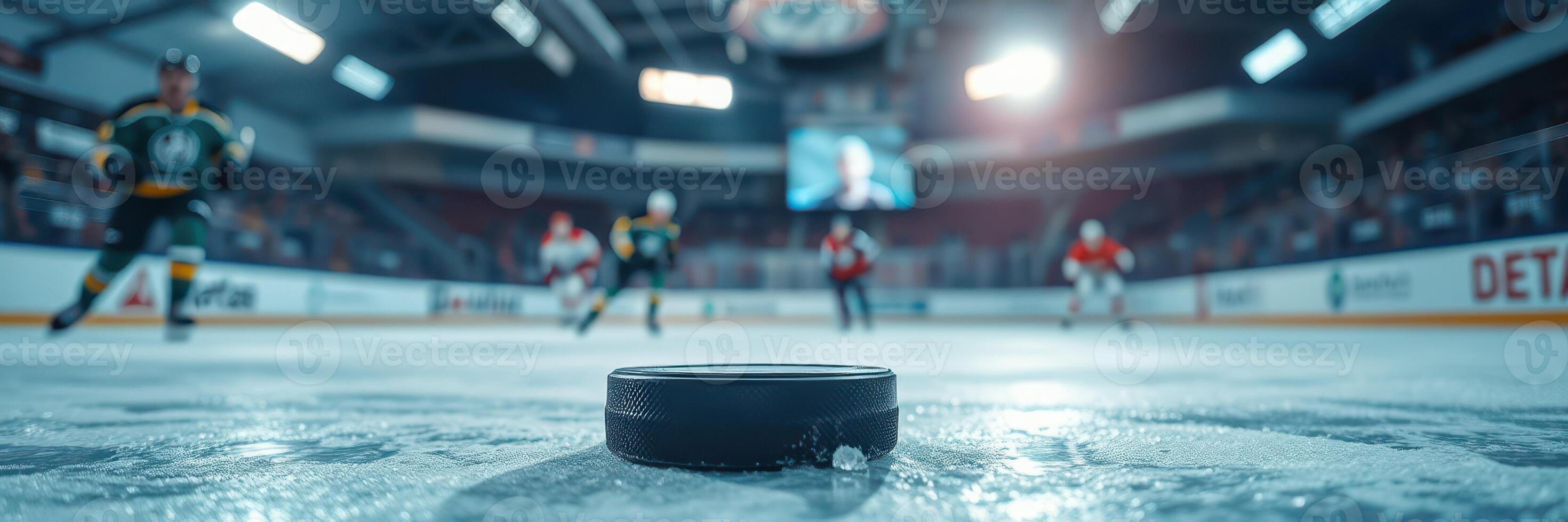 Exciting ice hockey game featuring players competing in a well-lit arena during a thrilling match photo
