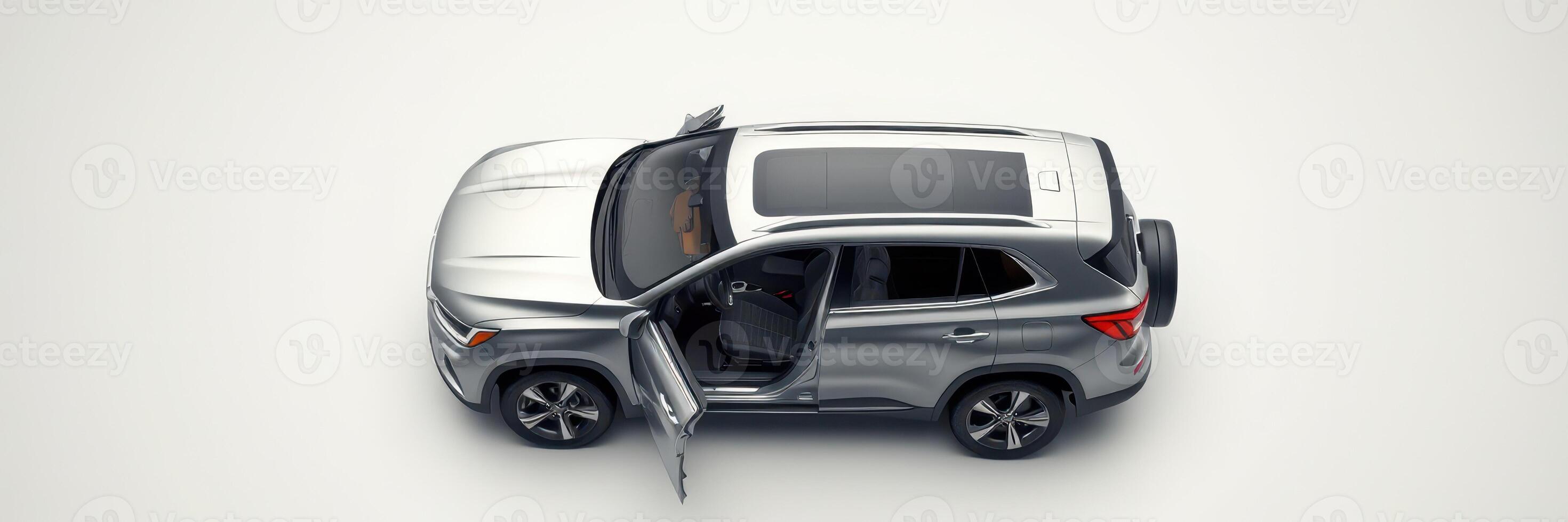 Silver SUV parked with open doors, showcasing interior design and spaciousness photo