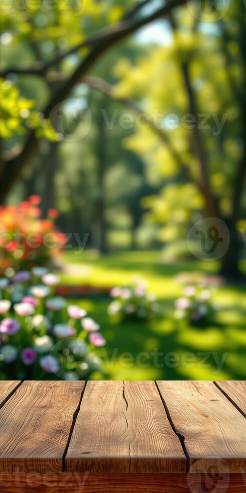 Beautiful garden with blooming flowers and sunlight filtering through trees in a vibrant natural setting photo