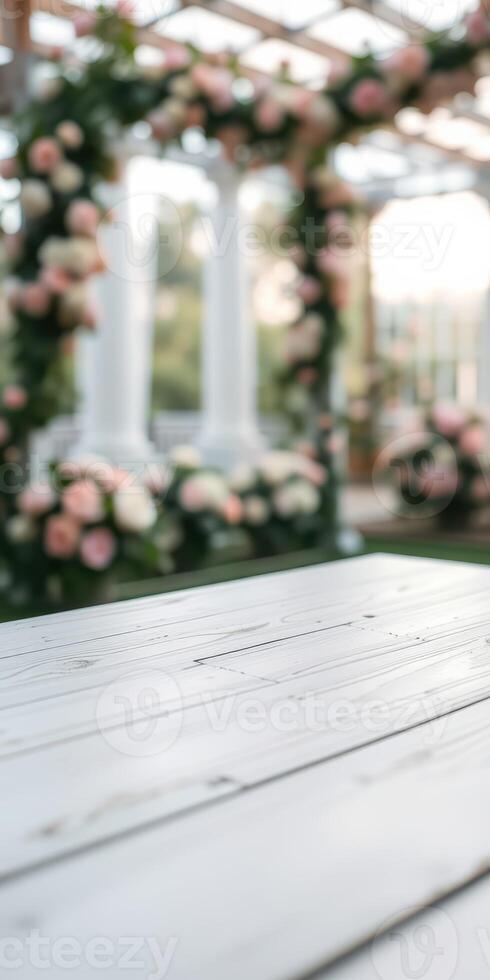 Elegant outdoor setting with wooden table and floral decorations for a special event photo