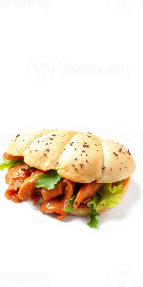 Delicious sandwich featuring tender chicken and fresh lettuce in a soft roll served on white background photo