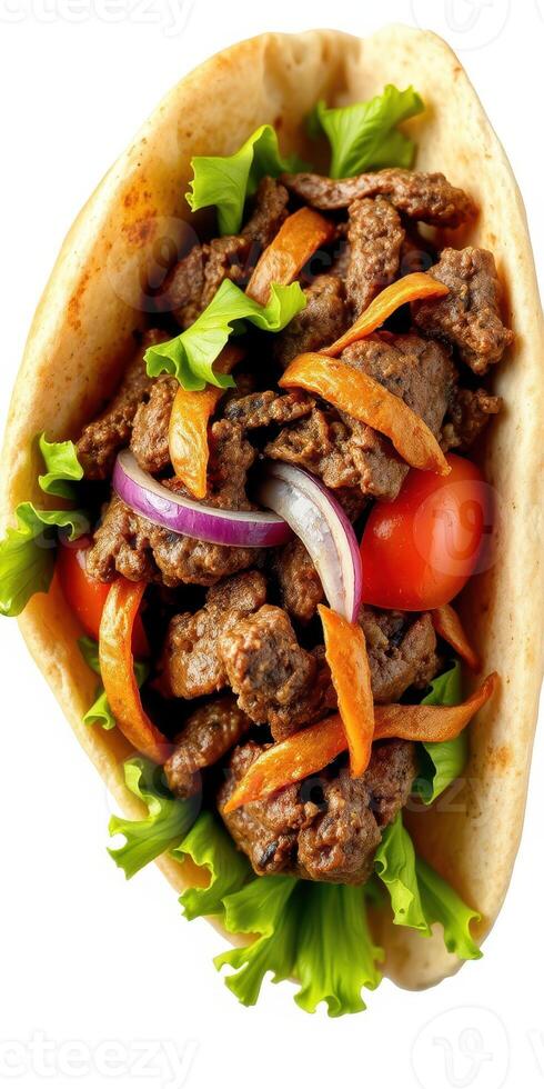 Delicious beef wrap with fresh vegetables served in a soft flatbread at a local eatery photo