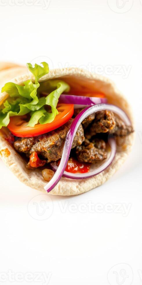 Savory beef wrap filled with fresh vegetables and spices prepared in a cozy kitchen setting photo