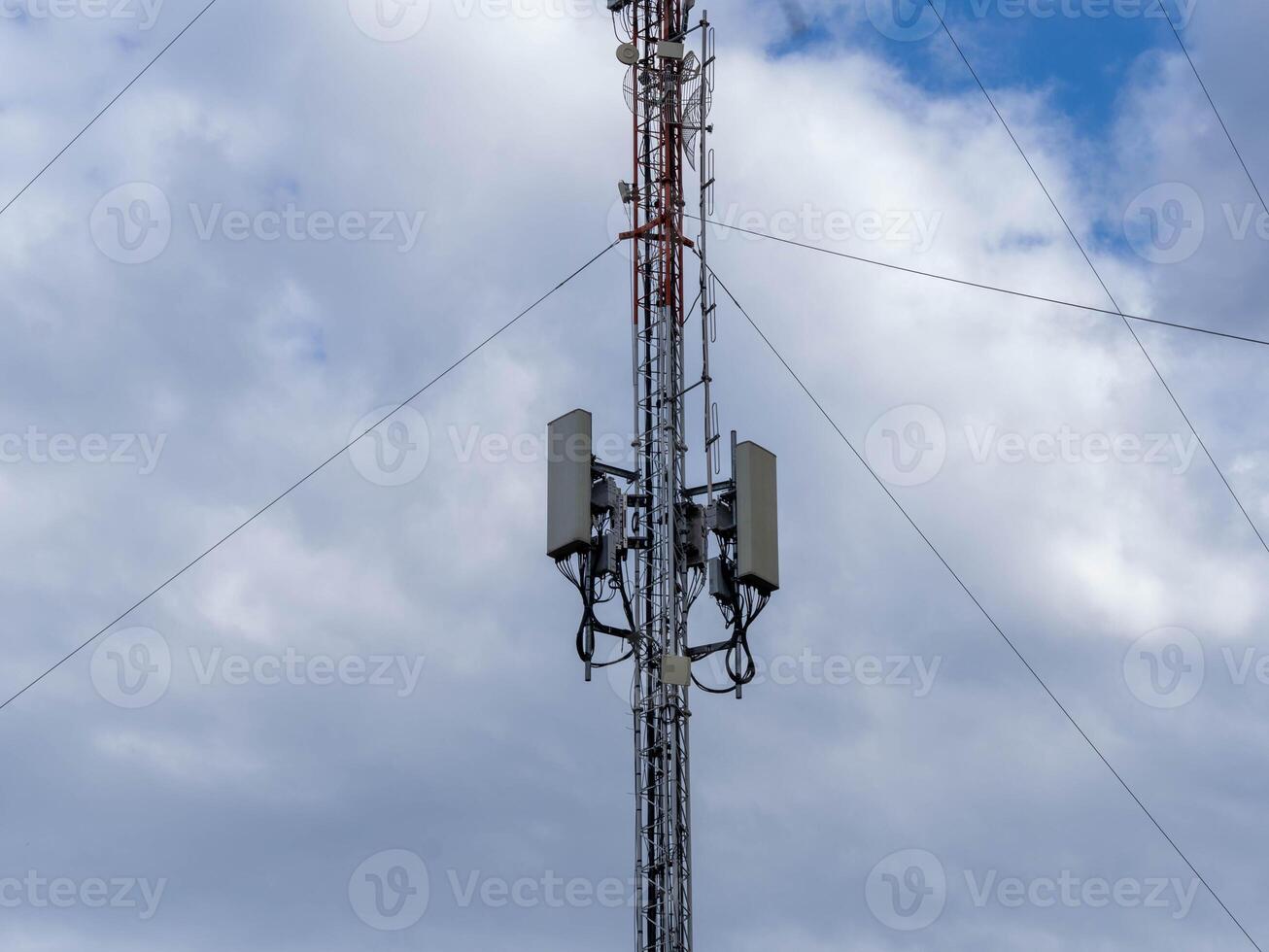 Telephone antenna telecommunication network on the sky background. Technology communication network photo