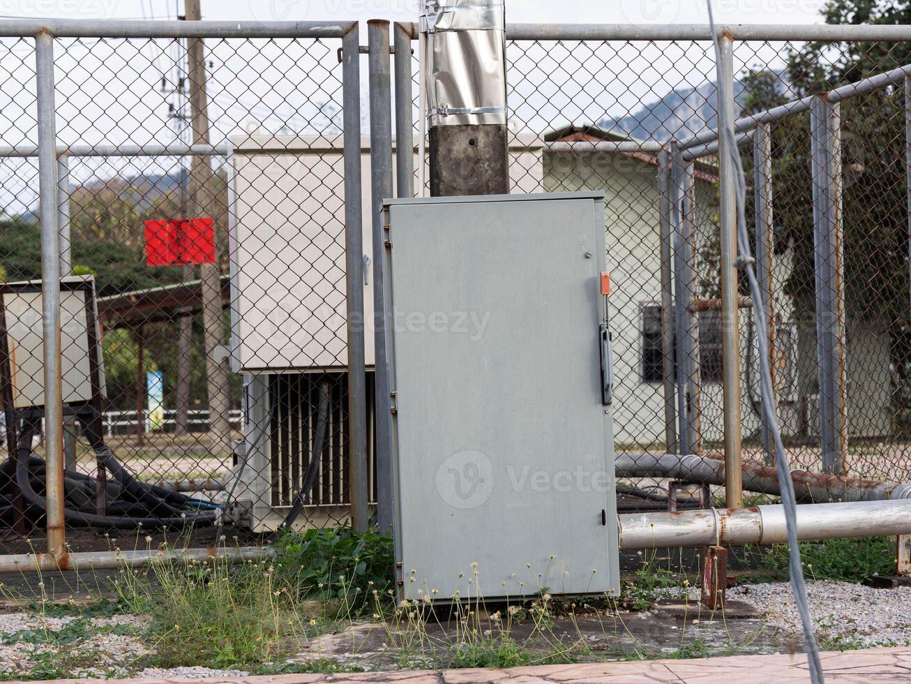 Electric locker in the park. Outdoor high-voltage power supply cabinet in the park. photo