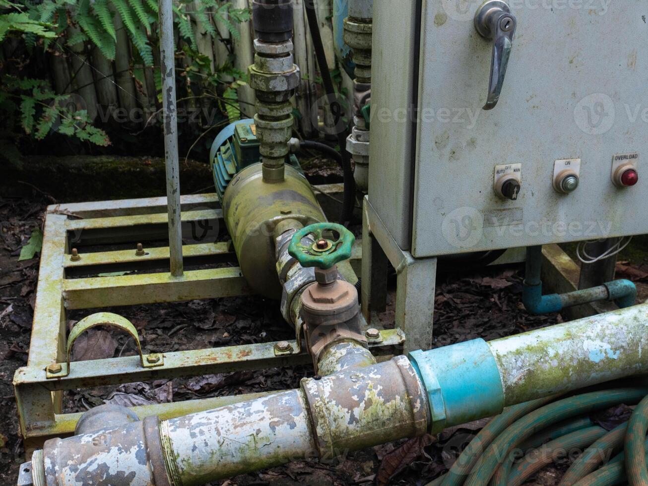 Shut-off valve at the Royal Agricultural Station pumping station, a water delivery pipe with a water storage tank in the technical room to supply high-pressure water. photo