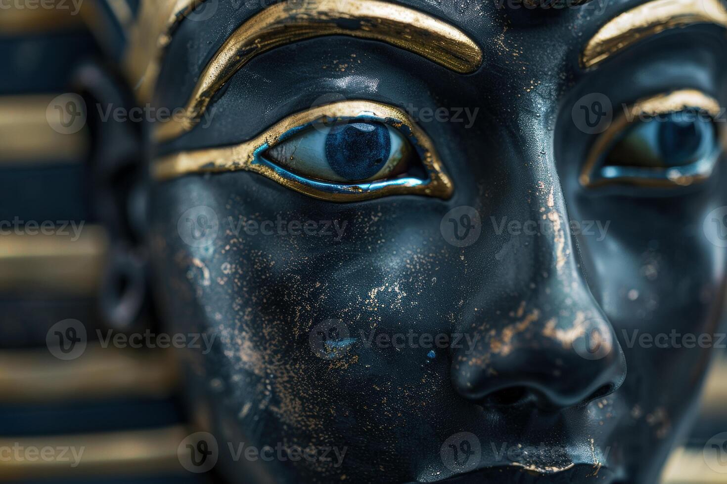Close up of an ancient egyptian mask with intricate details photo