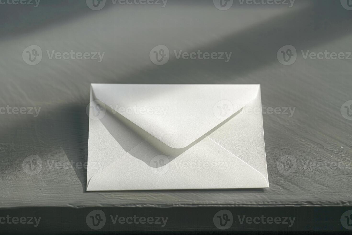 Envelope on a wooden table photo