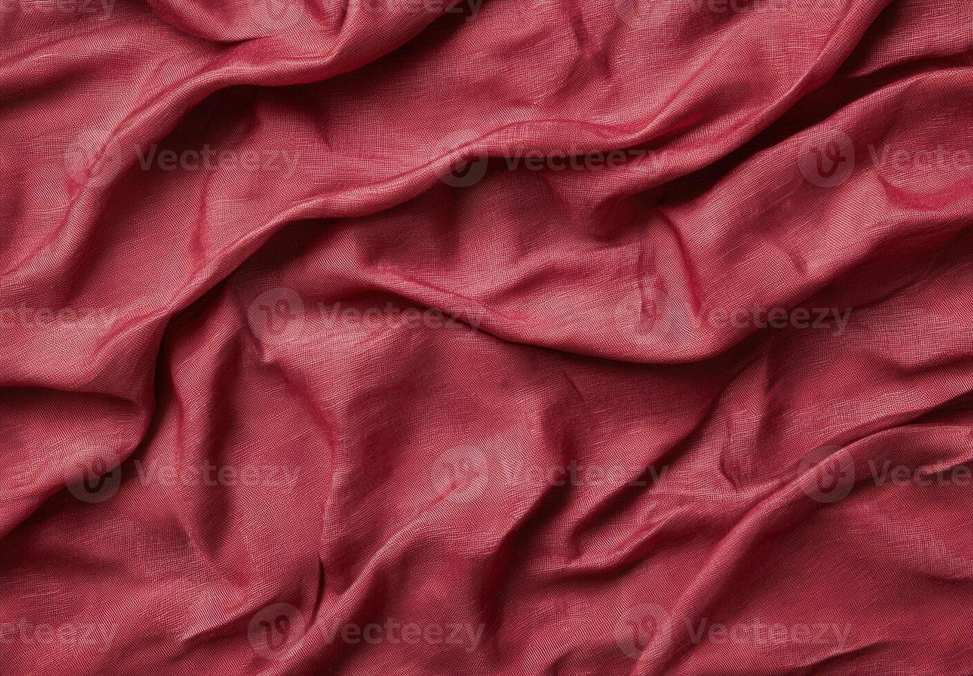Crumpled red fabric texture background photo