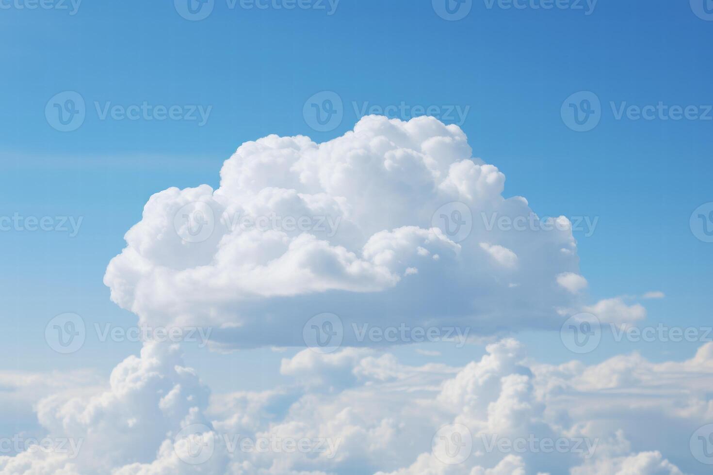 Fluffy white clouds in a blue sky photo