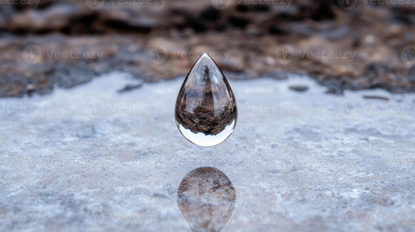 Transparent water droplet on frozen surface photo