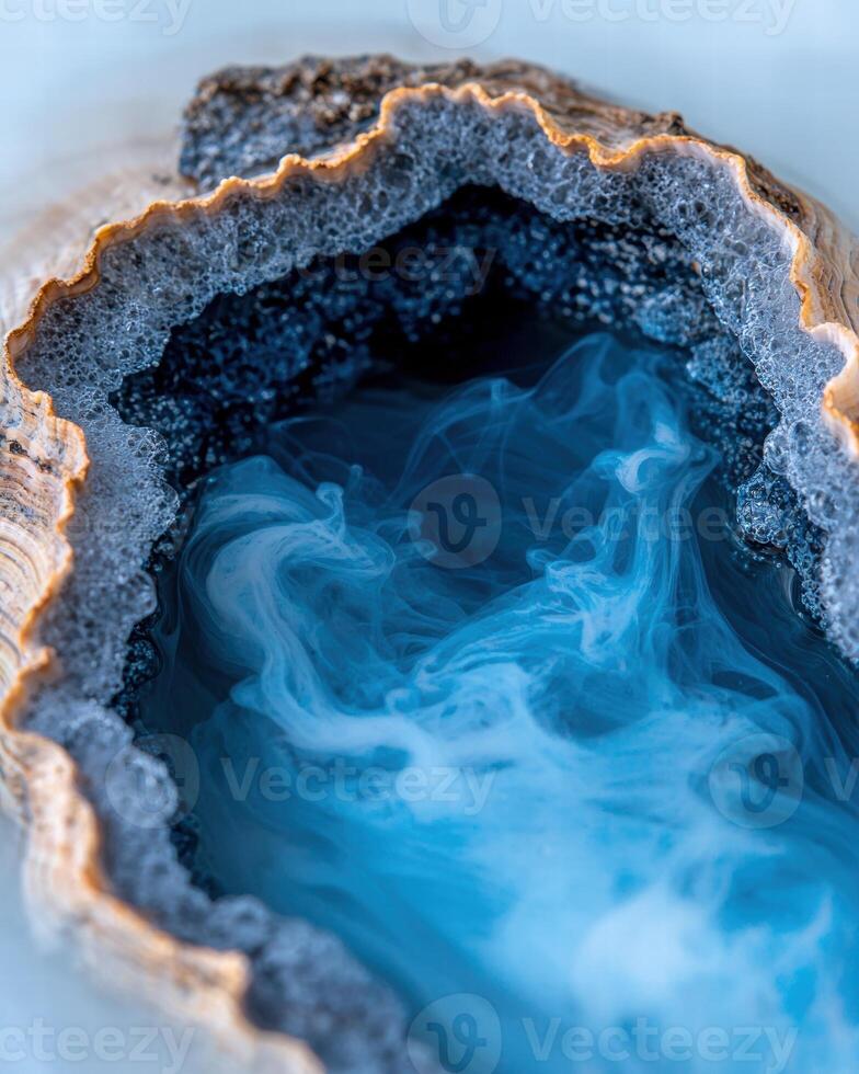 Stunning blue agate geode with natural crystal formations photo
