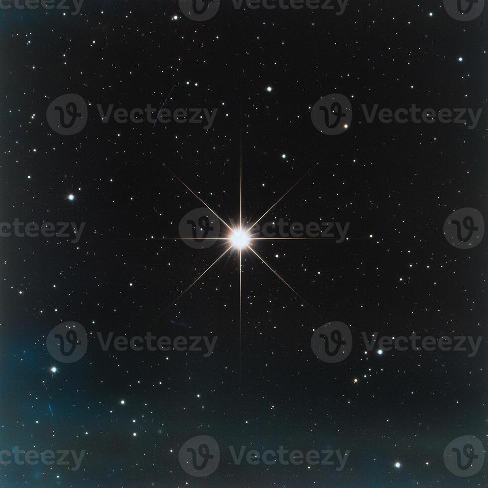Bright star in the night sky photo