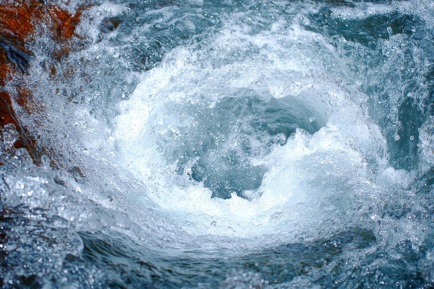 Rushing waterfall with splashing water photo