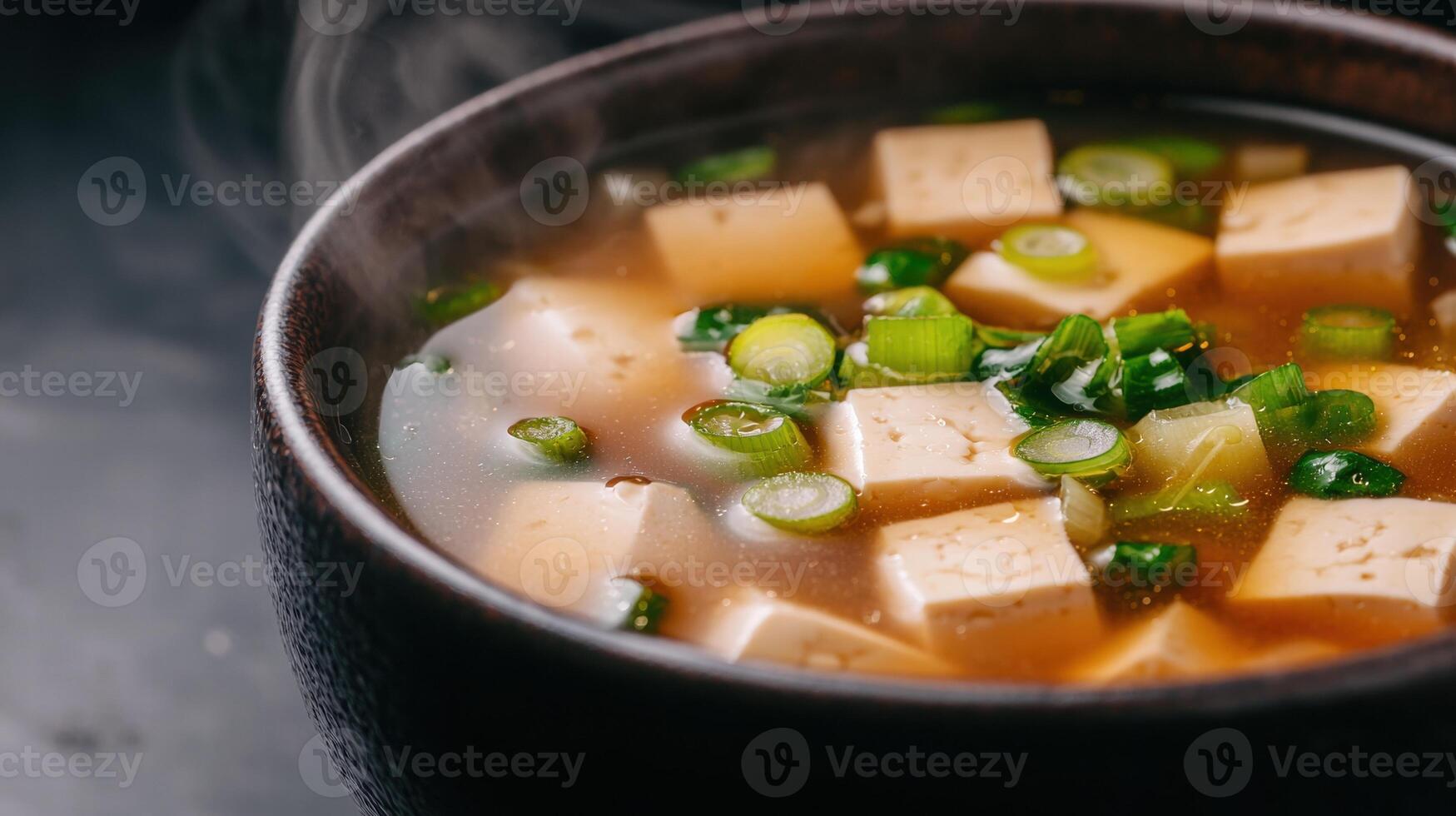 Delicious homemade miso soup with tofu and scallions photo