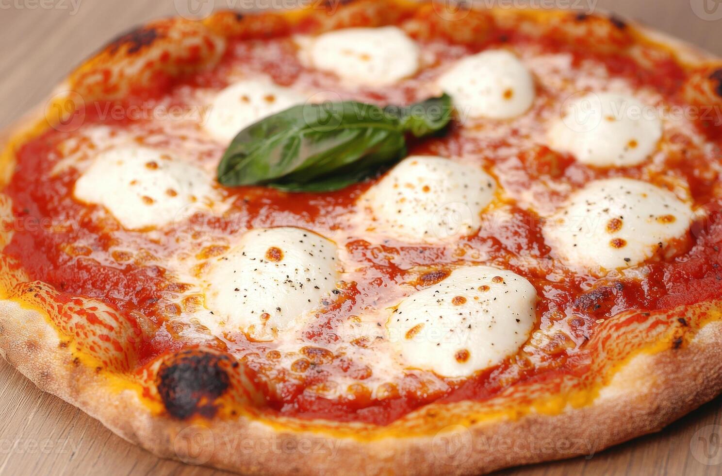 Delicious homemade pizza with fresh mozzarella and basil photo