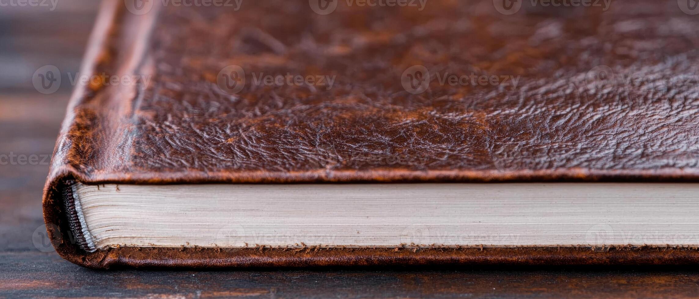 close up of an old leather bound book photo