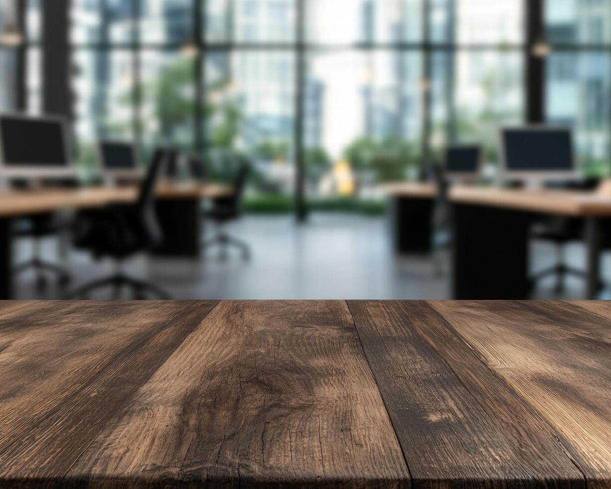 modern office workspace with wooden desk and large windows photo