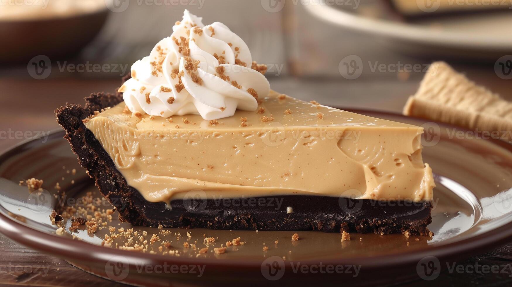 A decadent peanut butter pie with a creamy peanut butter filling and a chocolate cookie crust topped with whipped cream, photo