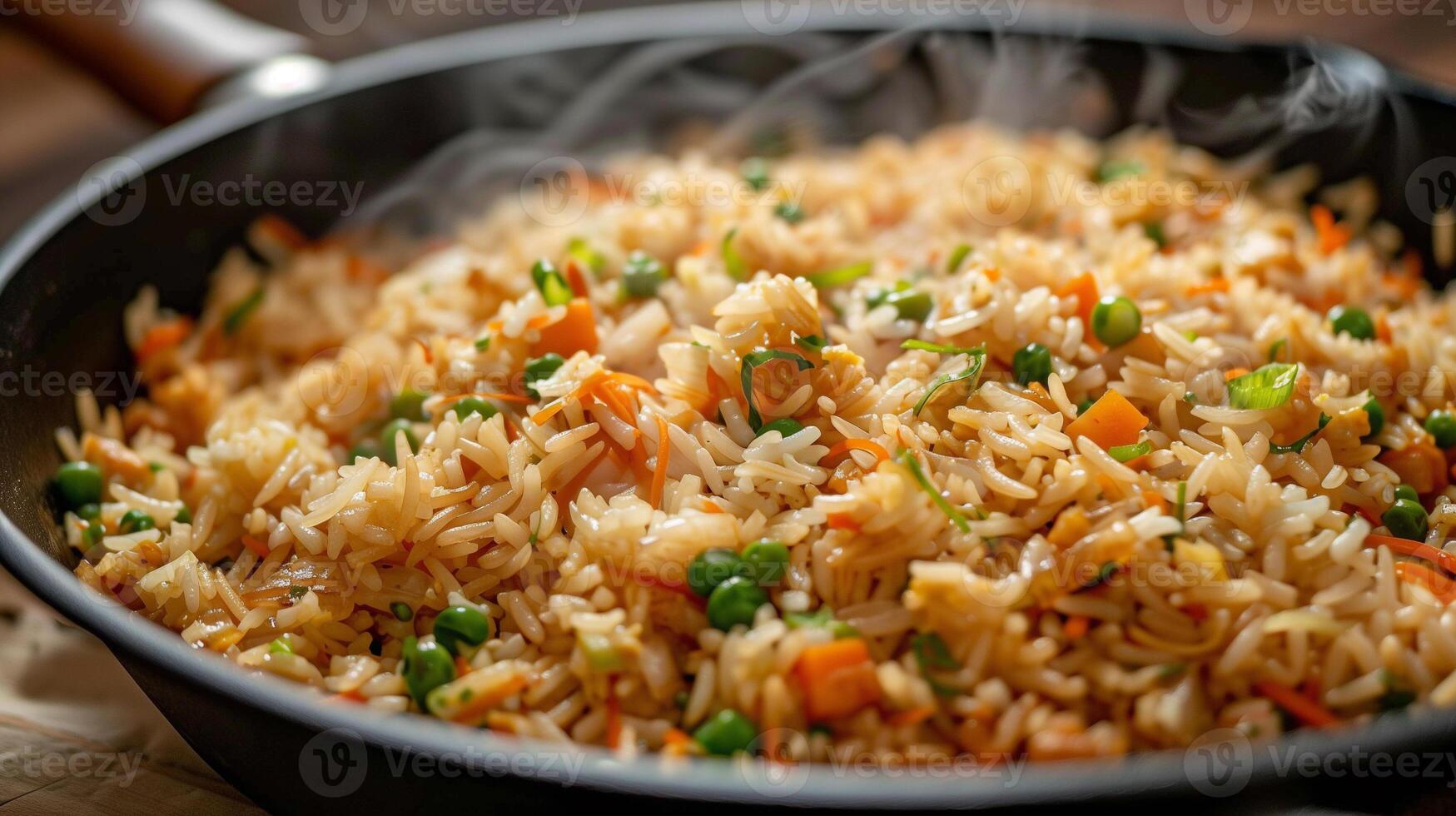 Large skillet filled with golden crispy fried rice mixed with vegetables and soy sauce steaming hot and ready to serve, photography photo