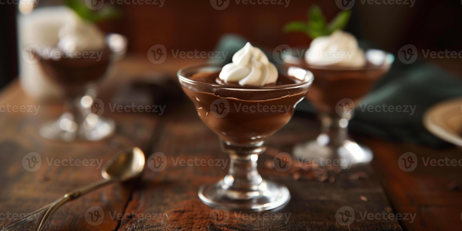 Gluten-free chocolate mousse served in glass cups with whipped coconut cream, photo