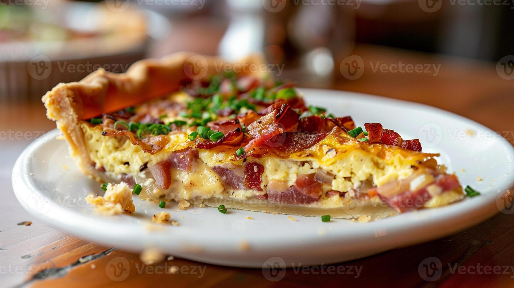 Quiche Lorraine with a golden flaky crust filled with bacon cheese and caramelized onions served on a white plate, photography photo